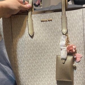 Michael Kors Gold and white Tote with Floral Charm